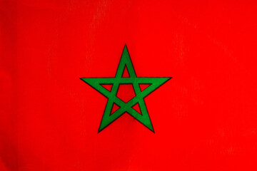 National flag of the state of Morocco close-up. State background.