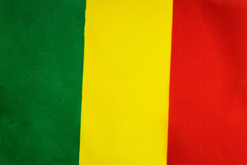 National flag of the state of Mali close-up. State background.