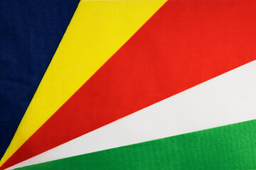 National flag of the state of Seychelles close-up. State background.