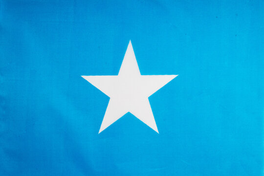 National flag of the state of Somalia close-up. State background.