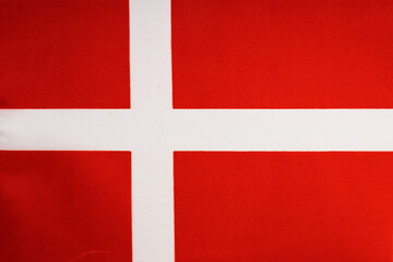 National flag of the state of Denmark close-up. State background.