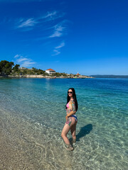 beautiful woman in a bikini on the beach