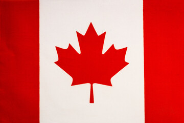 National flag of the state of Canada close-up. State background.