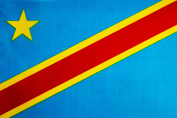 National flag of the state of DR Congo close up. State background.