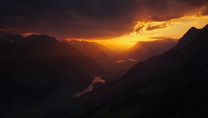 Naklejka premium Majestic Sunset Over Mountain Valley