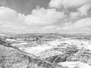 Green hills under blue summer sky landscape in Ireland, pencil drawn sketch illustration