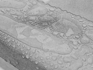 Water drops on a metal surface close view, raindrops on a fence pencil drawn sketch