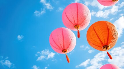 Obraz premium Colorful Lanterns Against Blue Sky