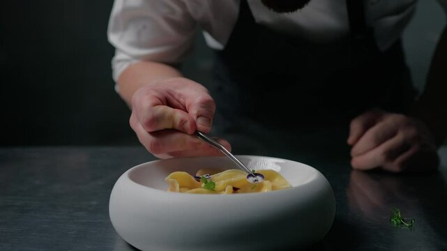 Refining The Plating Of A Ravioli Dish With Flowers