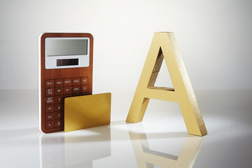 Calculator and A on a white background.
