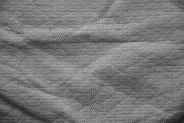 Processed image of fluffy gray doormat from bathroom in grey color
