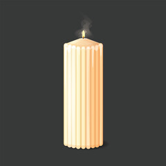 A large wax candle burning on a dark background.