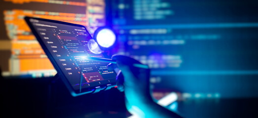 Technology background. Development, programming and coding technology concept. A programmer manually works with program code