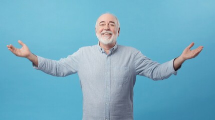 Naklejka premium Mature Caucasian man with open arms isolated on blue background , studio shot of an handsome white European old retired guy with happy smiling face welcome with open arms on soft color backdrop