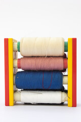 Spool Line Thread: A versatile and essential tool for various sewing and embroidery projects, including quilting, appliqué, and bobbin thread.