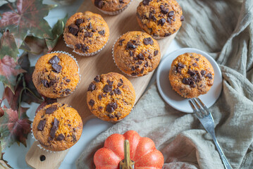 Homemade pumpkin muffins or cupcakes with chocolate 