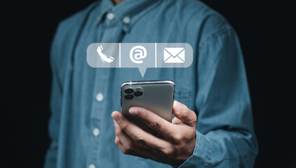 CONTACT US, Hand of Businessman touching mobile phone contact (email, address, live chat, internet wifi) icon. Contact us or Customer support hotline people connect. Cutomer support concept..