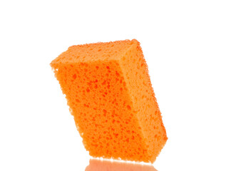 One kitchen sponge, macro, isolated on white background.