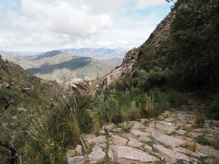 Inca trail to Maragua Crater, in the moutainous region of Cordillera de los Frailes. Near Sucre, Bolivia. A famous hike on a pre-hispanic trail down to the crater.