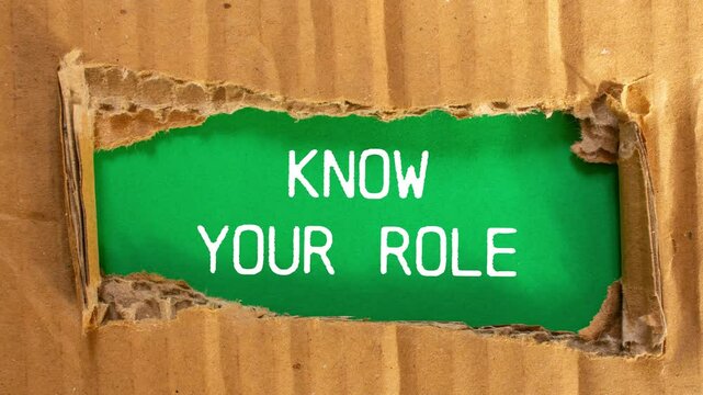 Know your role message writing on ripped torn cardboard paper on green background. Conceptual know your role symbol.