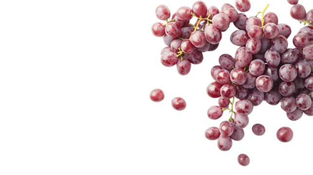 Fresh red grapes on a white background, perfect for healthy eating and summer vibes.