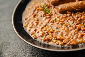 Lentil with sausages tasty food dish second course аresh delicious gourmet food background on the table rustic food top view copy space top view