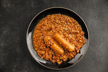 Lentil with sausages tasty food dish second course аresh delicious gourmet food background on the table rustic food top view copy space top view