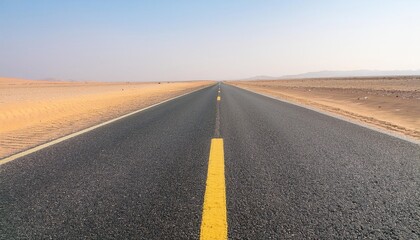 Fototapeta premium empty asphalt highway and sandy desert land side landscape at sunrise