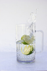 Lime Splashed Water motion photography in the studio.