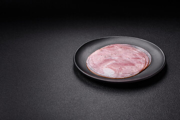 Ham cut into round slices with salt, spices and herbs