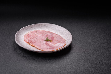 Ham cut into round slices with salt, spices and herbs