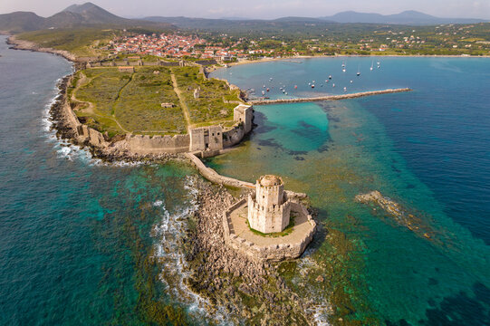 Aerial drone view of Methoni Castle with methoni village as a background   in Messinia, Greece