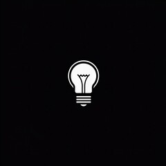 A minimalist black background with a white lightbulb icon in the center, symbolizing innovation, ideas, and creativity. The clean and simple design highlights the concept of bright ideas or energy