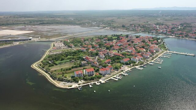 Drone View of Nin Islet Surrounded by Sandbars and Saltworks