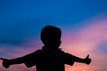 Fototapeta premium Happy children playing on nature summer silhouette