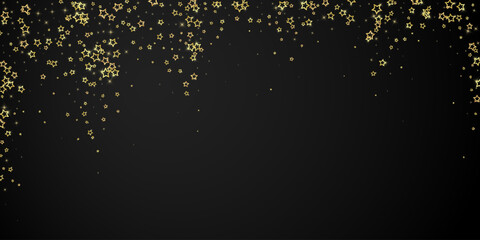 Gold sparkling star confetti.