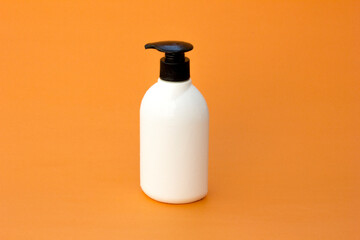 This white bottle with a pump is eco-friendly and reusable.