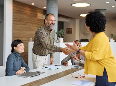 business meeting businessman office teamwork businesswoman handshake agreement applause hand shake shaking man applauding colleague group seminar conference