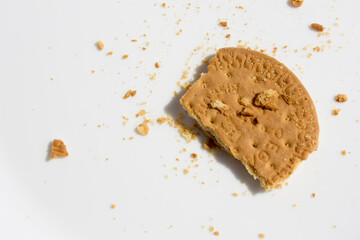 Traditional Indonesia biscuits, rich and crumbly, presented in classic white plate.
