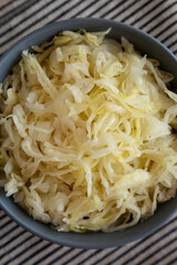 Homemade German Sauerkraut in a Bowl, top view.