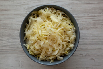 Homemade German Sauerkraut in a Bowl, top view. Flat lay, overhead.