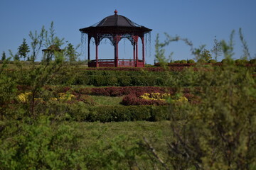 Gazebo or pavilion in a landscaped garden