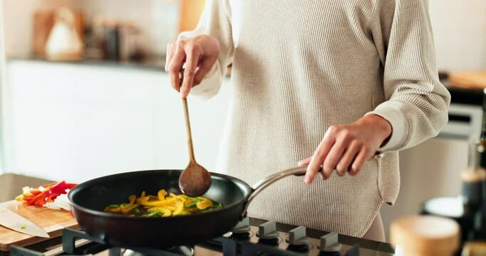 Hands, person and cooking or stir food in kitchen for meal prep, healthy lunch and nutrition of morning breakfast. Chef, pan and vegetables for dinner process, salad ingredients and vegan at house