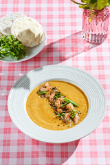pumpkin soup with shrimp and pumpkin seeds