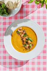 pumpkin soup with shrimp and pumpkin seeds