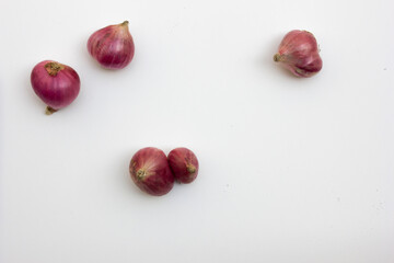 5 pieces shallots in the white background.