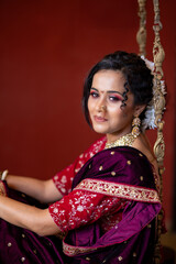 Timeless Elegance: A Marathi Woman Enjoying Peaceful Time on a Swing