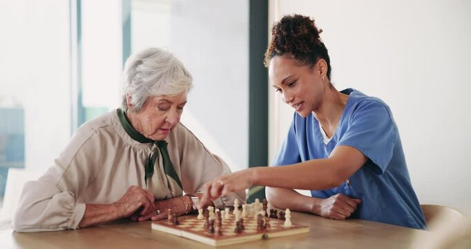 Chess, elderly woman and nurse playing at table for moving, strategy or board game challenge. Solution, teaching and senior person with caregiver for cognitive skills, tactics or retirement home