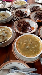 Indonesian's traditional food called gulai and satay