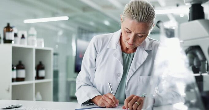 Woman, scientist and checklist in lab for writing, stats and progress in clinical analysis. Mature person, study and research for notes, clipboard and admin for vaccine development at pharma company